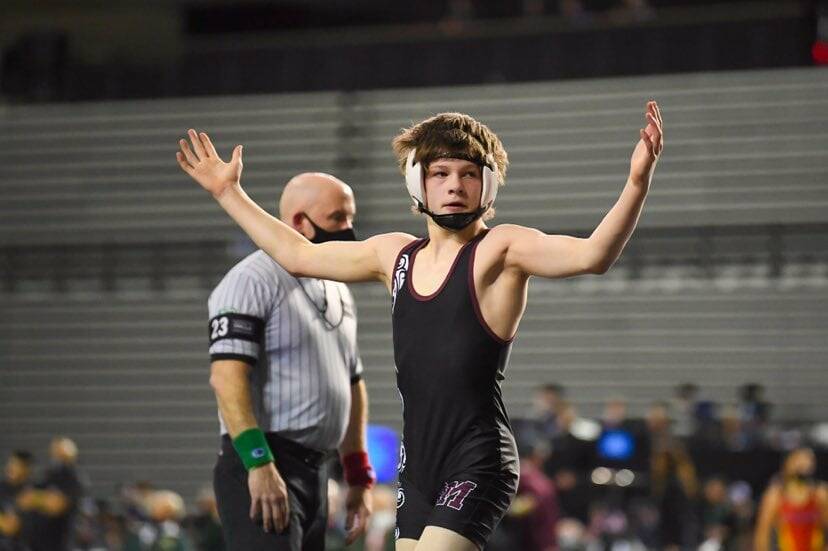 Mercer Island High School freshman Gordon Gibson notched the 113-pound 3A state wrestling championship on Feb. 19. Photo courtesy of Dee Torres/Mi Lente Photography