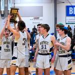 Northwest Yeshiva High School boys basketball players celebrate winning the Northwest District 1 1B championship over Mount Vernon Christian, 57-46, on Feb. 19. The Mercer Island squad (15-3-1 overall) qualifies for state and will tip off in the first round against Naselle at 9 a.m. March 2 at Spokane Arena. At regionals, Moses Lake Christian Academy/Covenant Christian School defeated the locals, 61-60, on Feb. 26 at Bellevue College for state seeding. Lion senior Yoel Kintzer was named the Sea-Tac B League most valuable player, senior Dovi Goldberg is a first-teamer and senior Victor Maimon is an honorable mention. Photo courtesy of Patrick Krohn