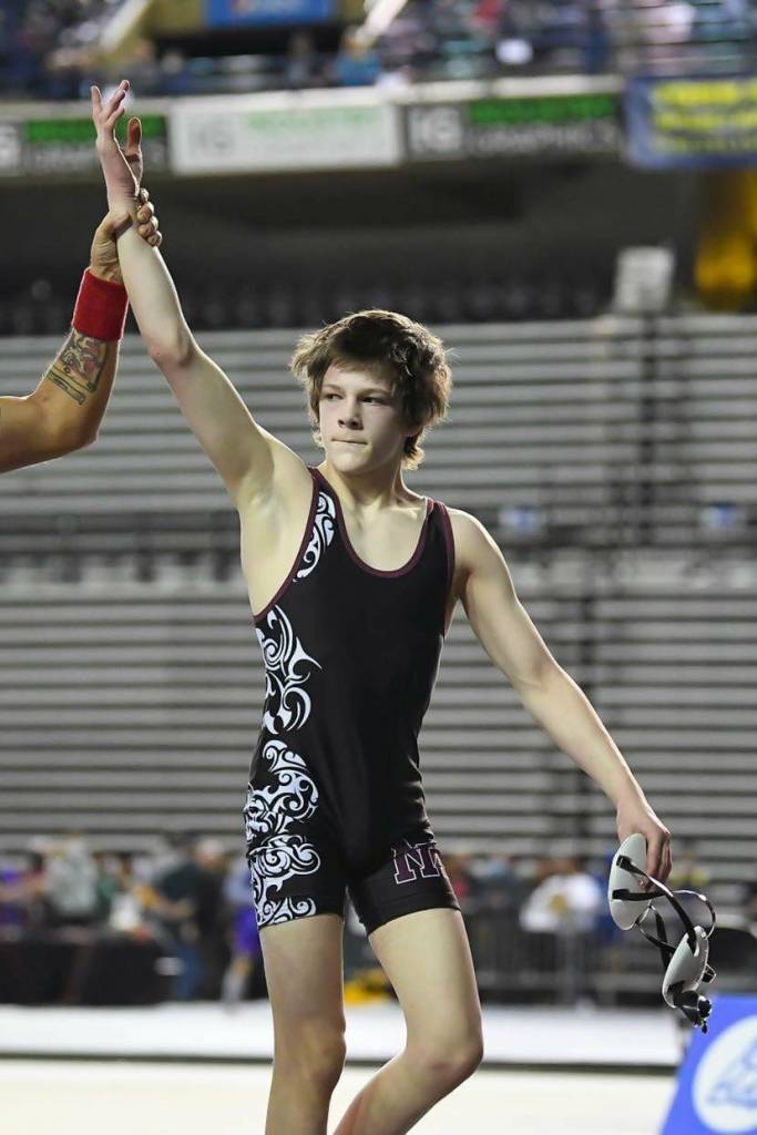 The Washington Interscholastic Activities Association recently named Mercer Island High School freshman Gordon Gibson one of its athletes of the week. Gibson notched the 113-pound 3A state wrestling championship on Feb. 19. The grappler sported a 35-3 overall record and is the first freshman in school history to win a state wrestling title. In addition to competing in wrestling, Gibson trains in Brazilian jiu jitsu, skateboards and holds a 4.0 grade-point average. Photo courtesy of Dee Torres/Mi Lente Photography