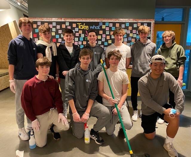 National League of Young Men on Mercer Island members recently volunteered at Marys Place in Seattle by cleaning and assembling toiletry care packages. They are, back row, left to right: Cody Fosseen, Matthew Loeser, Graham Givan, Alexander Singh, Jack Sieckhaus, Woody Brown and Douglas Stovall. Front row, left to right: Zachary Geisner, Joe McCormack, Oliver Bellin and Logan Hsu. Photo courtesy of Sharon Singh