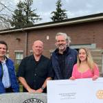 From left to right, David Thompson, treasurer of the Mercer Island Rotary Club Foundation; Wally Boos, chair of the Mercer Island Rotary Club Scholarship committee; Victor Raisys, father of Vaiva Raisys, Mercer Island High School senior and Mercer Island Rotary Club Scholarship recipient; and Laurie Raisys, mother. Courtesy photo