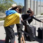 People embrace at the Mexico-United States border near San Diego. Courtesy of Matthew Smith