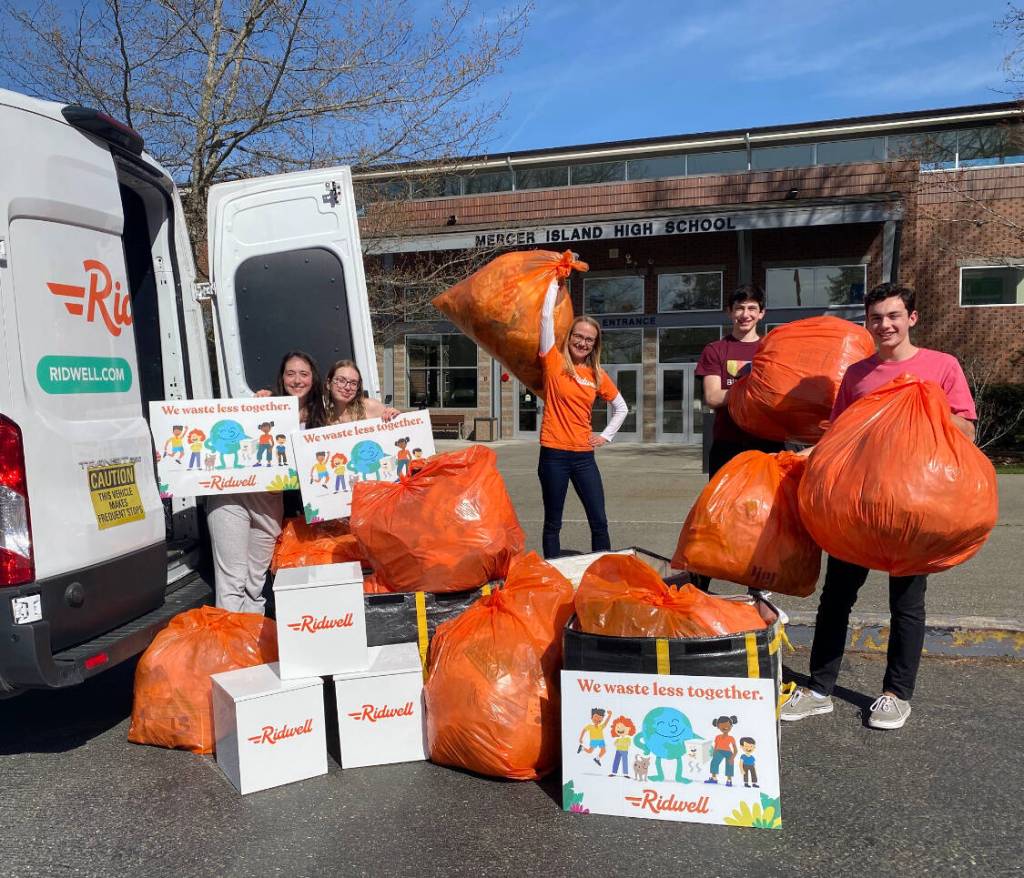 Mercer Island High School Green Team members, from left to right, Alex Weil (co-president), Lainie Wion, Harry Weil and Alexander Aylen. Ridwells Erin Metzger stands in the middle. Courtesy photo