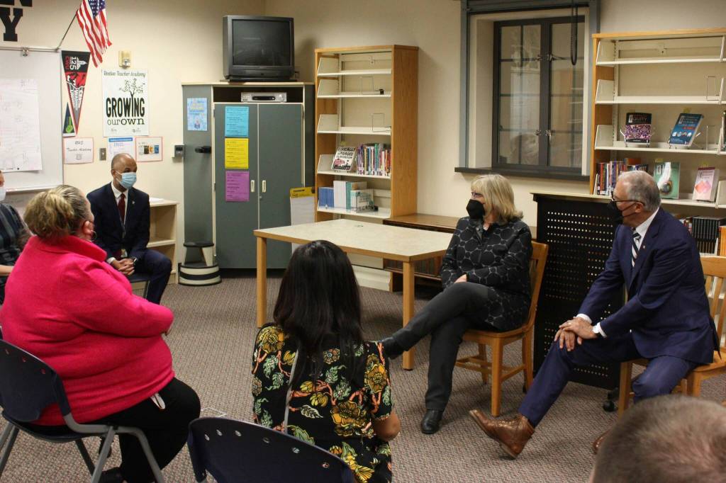 Gov. Jay Inslee and his wife, Trudi Inslee, listen to challenges faced by teachers on May 4 in Renton. (Cameron Sheppard/Sound Publishing)