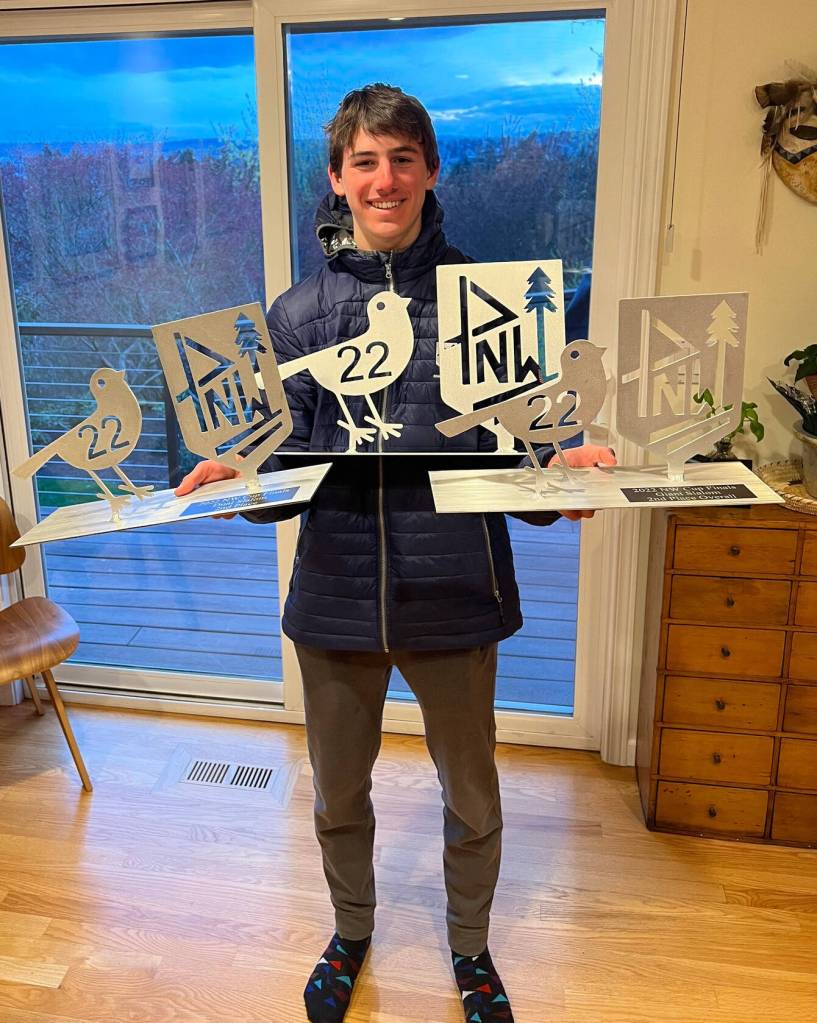 Oliver Loeser displays his Northwest Cup Finals trophies. Photo courtesy of Thomas Loeser