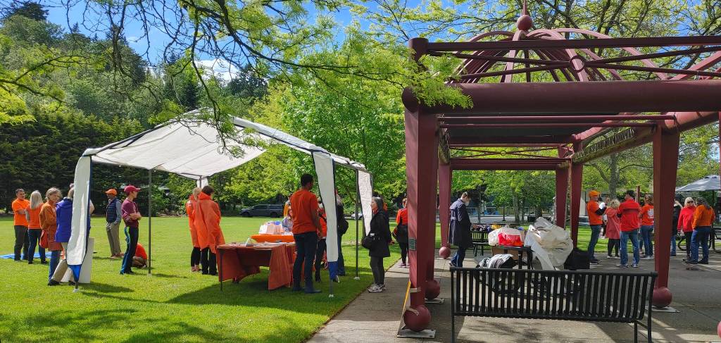 People sport orange at the Mercer Island PTA Committee on Gun Violence Prevention gathering on June 3 at Mercerdale Park. Andy Nystrom/ staff photo