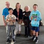 West Mercer Elementary teachers and students meeting Judy after her presentation. From left: 4th grade teacher David Baxter, 4th grade student Miles Chow, 4th grade teacher Sherry Isaacs, Judy Kusakabe, and 4th grade student Evan Manfredo. Photos by Soyun Chow