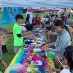 Participants delve into their art projects at a previous Mercer Island community event. Photo courtesy of MIVAL