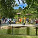 Children and adults get in some play time at the newly renovated Mercerdale Park playground on July 9. Photo courtesy of Terry Lee