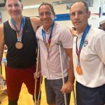 From left to right: Charlie Barokas, Al Moscatel and Glen Coblens gather after the awards ceremonies at last months 2022 Maccabiah Games in Israel. Photo courtesy of Mia Birk