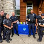 From left to right at the Coffee With a Cop community gathering on Aug. 20 at Starbucks: Mercer Island Police Departments sergeant George Schmalhofer, corporal Samantha Hammer, chief Ed Holmes, officer Kelly Robinson, detective Max White and officer Kristina Lum. Photo courtesy of the Mercer Island Police Department