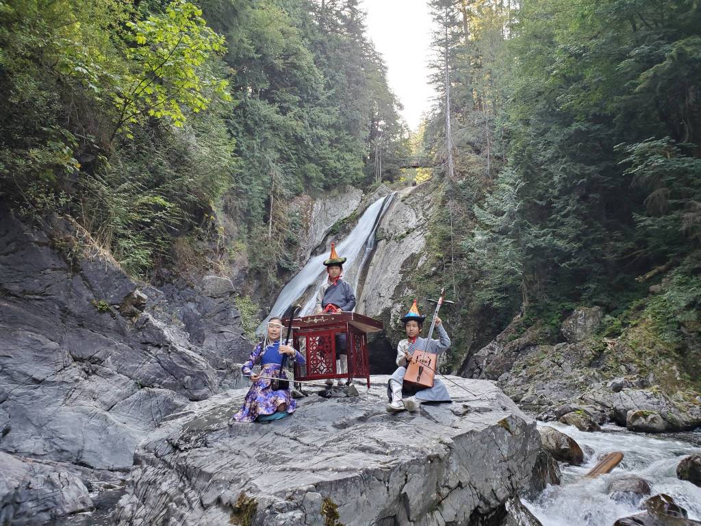 Courtesy photo
From left, Anu-Ujin, Temuulen and Temuujin Batbaatar during a video shoot at Twin Falls in North Bend.