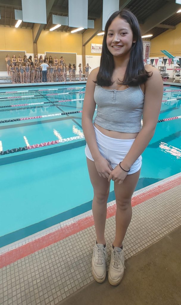 Alexa McDevitt stands near the Mary Wayte Pool before joining her teammates for pictures on a recent afternoon. Andy Nystrom/ staff photo