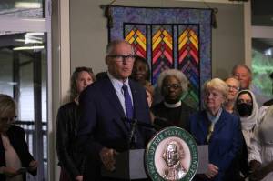Gov. Jay Inslee speaks about protecting Washingtonians rights to abortion and gender-affirming care at Wayside United Church of Christ in Federal Way on Oct. 28 Olivia Sullivan/the Mirror