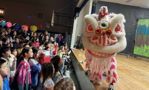 Families watch the Lion Dance performance. (Photos courtesy of Soyun Chow)