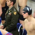 Mercer Island resident and Army West Point sophomore Alex Edwards (right) displays intensity before his record-setting swim in the 100-yard backstroke at the 2022 Army-Navy dual swim meet on Dec. 2. Photo courtesy of Sarah Edwards