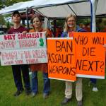 Andy Nystrom/ staff photo
From left to right, Ben Murawski, Judith Anderson and Caroline Haessly brought end gun violence signs to the Mercer Island PTA Committee on Gun Violence Prevention gathering on June 3 at Mercerdale Park.