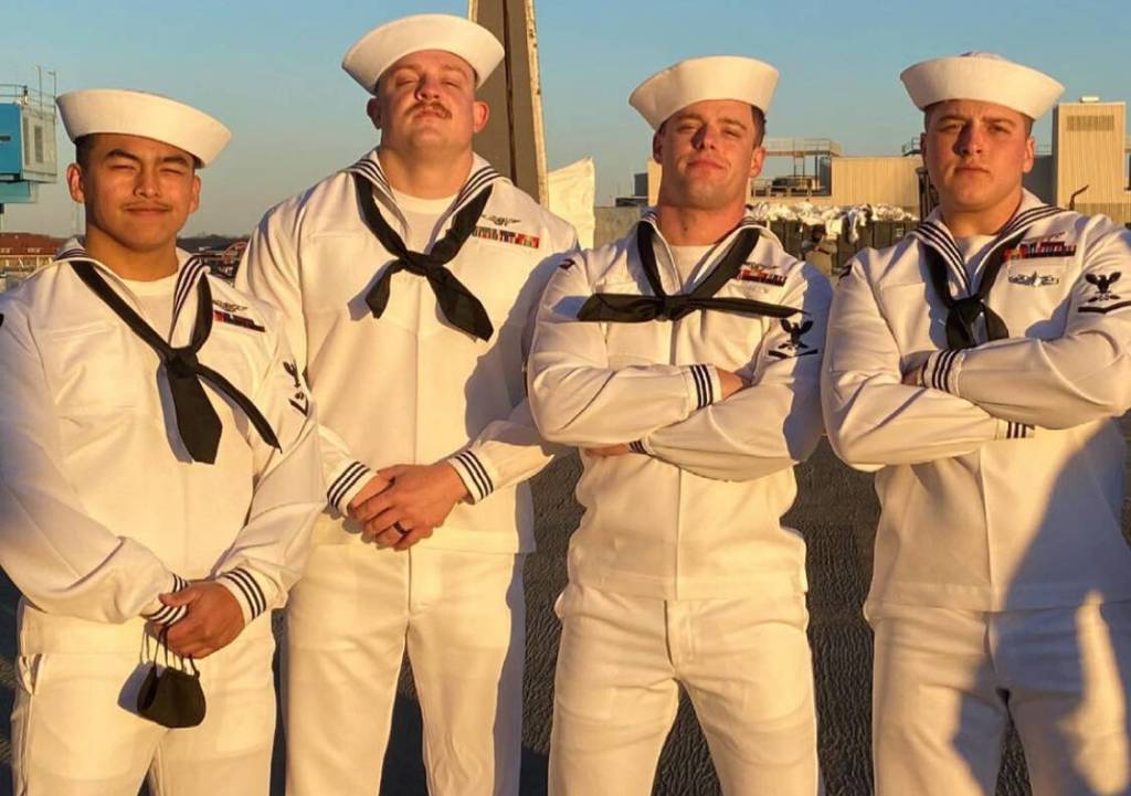 Courtesy photo
Gabriel Andrews of Mercer Island is pictured second from left. I hold the Navy in my heart for many reasons, but a large part of it is just saving my life, said Andrews.