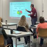Superintendent Fred Rundle, Executive Director of Finance and Operations Matt Sullivan and Director of Finance Kay Adams give a Mercer Island School District budget presentation to Northwood Elementary staff on Jan. 5. The community webinar on the district budget will take place from 5-6 p.m. on Jan. 19. For information, visit: <a href="bit.ly/3Fi9Zuq" target="_blank">bit.ly/3Fi9Zuq</a>. Photo courtesy of the Mercer Island School District