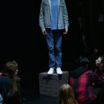 Jonathan Aggar stands on a block as Kyle Gerstel, Giovee Roque, Paige Kirby and Mia Vorkoper listen to his speech during a Mercer Island High School rehearsal of And a Child Shall Lead. Andy Nystrom/ staff photo