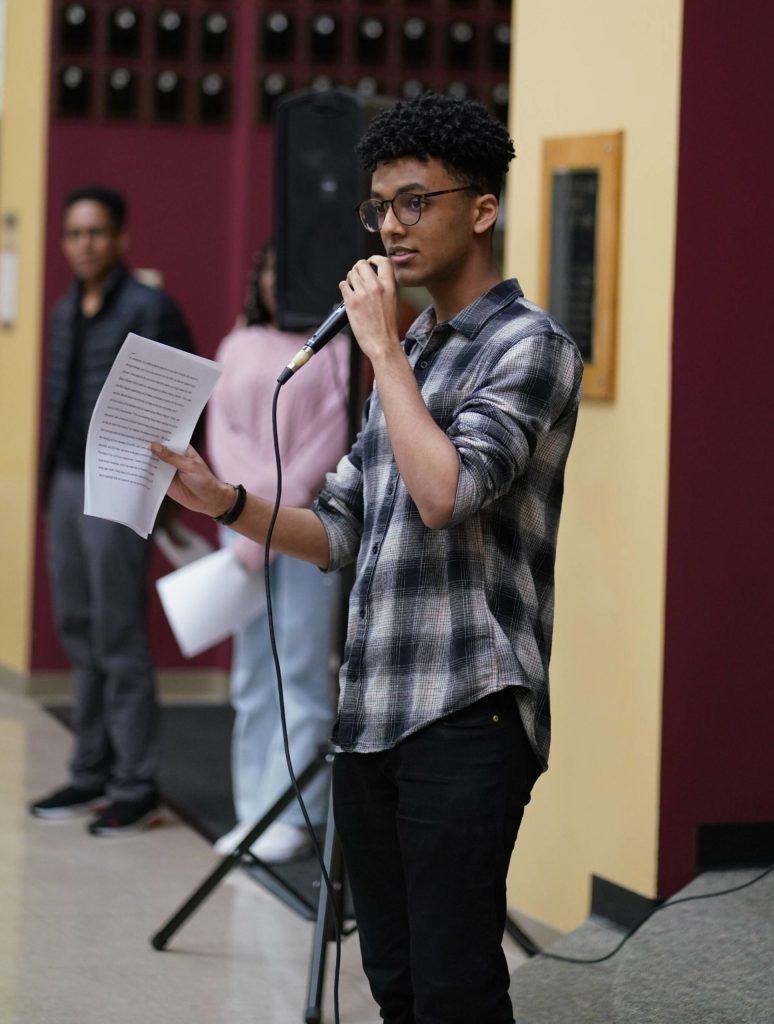 Brooks Kahsai gives a speech at the BSU dinner about the groups campaigns during Black History Month. Photo courtesy of Beniam Yetbarek