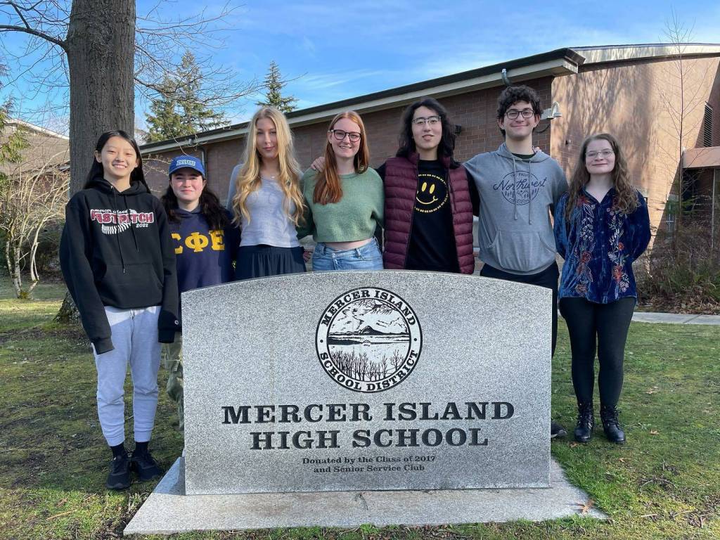 Mercer Island High School students, from left to right, Tong Lin, Samara Bluming, Charlotte Wood, Rachel Senn, Eliot Geer, Miles Silverman and Emily Horton King have been named 2023 National Merit finalists. In other school news, Islander Middle School seventh-graders in Patri Collins social studies class recently facilitated the collection of $919 from their fellow classmates for the Red Cross for Turkey-Syria Earthquake Relief. Collins dropped off the relief to Emily Kohler at the Northwest Region Red Cross. Photo courtesy of the Mercer Island School District