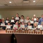KMIH 88.9 The Bridge students and staff at the Intercollegiate Broadcasting System Golden Microphone Awards in New York City on Feb. 25. Front row (from left): Theodore Freeman, Ellie Sadlier, Annabelle Hegarty, Sophia Azzano and Kate Lennington. Second row (from left): Joe Bryant, Natalie Woods, Alyssa Pangallo, Grace Go, Andrew Howison, Mathew Pangallo, Sophie Prock, Chloe Yang, Sadie Jensen, Ben Kreiger and William Acker. Courtesy photo