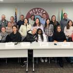 Mercer Island School Districts Superintendent Equity Advisory Council, which includes three students: Islander Middle School sixth-grader Lola Meeks (bottom left), Mercer Island High School junior Diego Silva (second row right) and Mercer Island High School freshman Omolara Olusanya (front row center, fourth from right). Photo courtesy of the Mercer Island School District