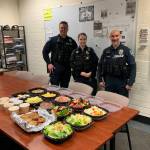 A group of Mercer Island community members dropped off a thank-you Easter meal for the Mercer Island Police Department. From left to right: Officers August Owen, Jacqueline Dawson and Art Munoz. Courtesy photo