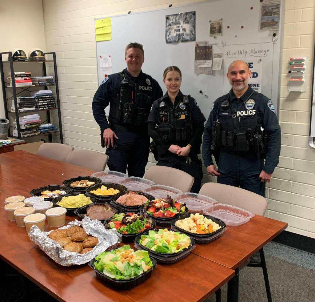 A group of Mercer Island community members dropped off a thank-you Easter meal for the Mercer Island Police Department. From left to right: Officers August Owen, Jacqueline Dawson and Art Munoz. Courtesy photo