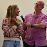 Last years scholarship winner Vaiva Raisys discusses her first year at the University of Michigan at the May 2 Rotary meeting. She is joined by Rotarian Wally Boos. Andy Nystrom/ staff photo