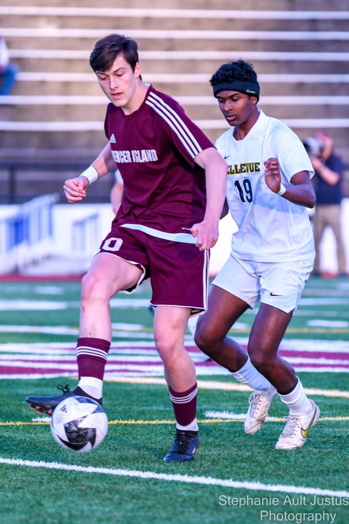 Mercer Island High School senior Leo Berkley, left, competes against Bellevue High Schools Nathanael Simon during the Islanders 5-1 victory on May 2. Photo courtesy of Stephanie Ault Justus