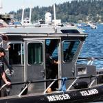 Mercer Island Police Department Marine Patrol officers survey the scene on Lake Washington during Seafair on Aug. 7, 2022. Andy Nystrom/ staff photo