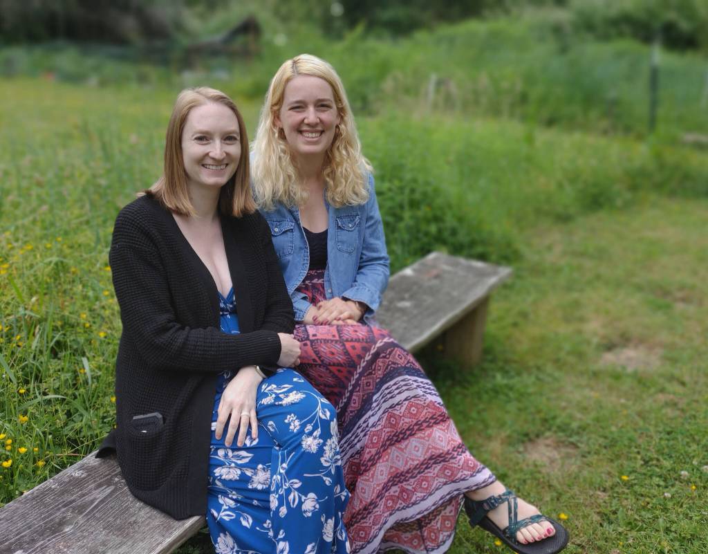 Stroum Jewish Community Centers Lisa Williams, left, and Aliza Glatter relax in the campus Kesher Community Garden. Andy Nystrom/ staff photo