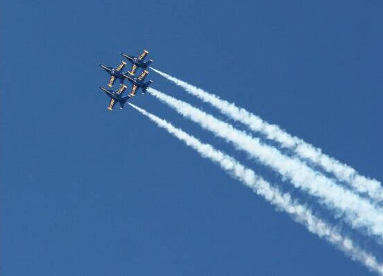 The U.S. Navy Blue Angels soar through the air on Aug. 7, 2022, in this photo taken from the Groveland Beach Park pier. Andy Nystrom/ staff photo