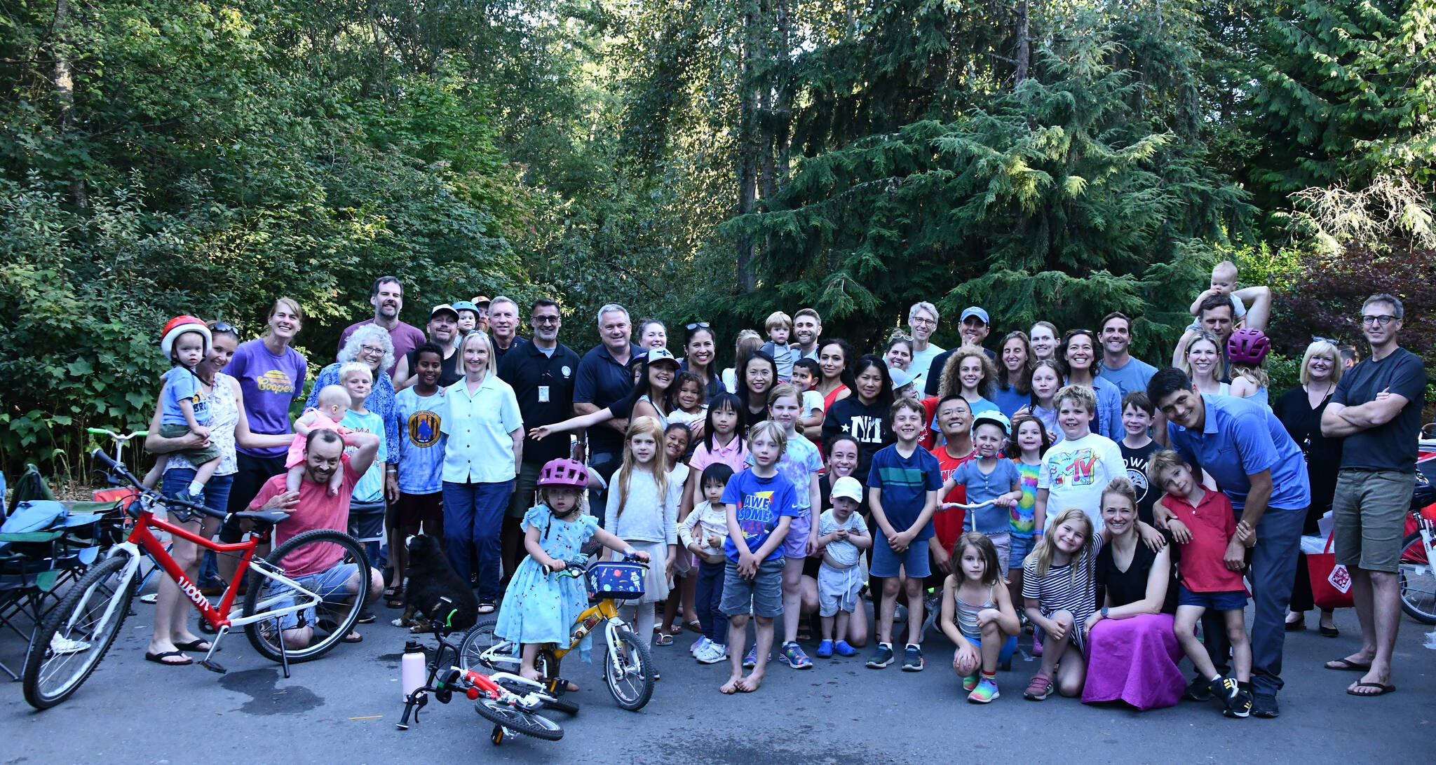 Mercer Islanders gather in the Ellis Pond neighborhood along with Mayor Salim Nice, Mercer Island Police Department Chief Ed Holmes and the citys emergency management leader Amanda Keverkamp at a National Night Out gathering on Aug. 1. Islander Jordan Naftolin organized this robust event in his area. The national campaign promotes police-community partnerships and focuses on crime prevention and resident connectedness. Story to come. Andy Nystrom/ staff photo