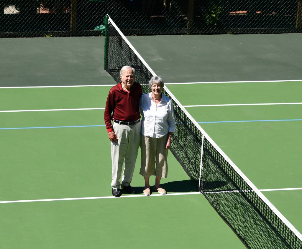 The Hodges stand at center court on a recent August day. Andy Nystrom/ staff photo