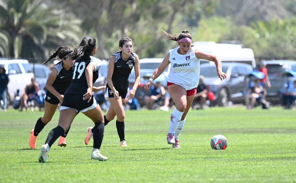 Naomi Johnson (white jersey) competes with her girls U15 Eastside FC team at the Surf Cup in San Diego in August. Courtesy photo