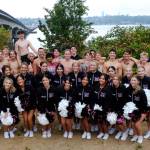 Mercer Island High School boys water polo team members gather with their coaches and the schools cheerleaders on Aug. 29. Courtesy photo