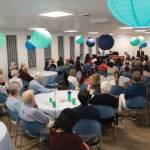 The fundraiser crowd gathers at the Mercer Island United Methodist Church Fellowship Hall. Photo courtesy of Brooks Kahsai