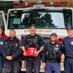 The Mercer Island Fire Department recently secured brand new, lifesaving AED (automated external defibrillator) devices for Mercer Island Police Department officers to utilize in every police patrol vehicle and on board its Marine Patrol boats. Officers are all first-aid trained and are immediately dispatched to every medical call involving a cardiac arrest. Officers are often already driving around the Island and can arrive to the scene ahead of the fire trucks and begin CPR. This teamwork between us and our fire department can mean the difference between life and death when every minute counts, the police department noted. Pictured are, from left to right, fire department Lt. Ray Austin, the police departments Sgt. David Canter, officer Jordan Tranter and officer Luiz Paz and firefighter Joe White. Photo courtesy of the Mercer Island Police Department