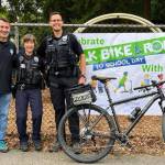 From left, Mercer Island Mayor Salim Nice, Mercer Island Police Department police support officer Anna Ormsby and officer Chase Erickson visited Island Park Elementary School on the morning of Oct. 4 for the schools Walk, Bike and Roll to School Day. Photo courtesy of the Mercer Island Police Department