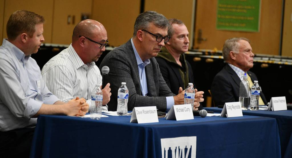 From left to right, city council candidates Dave Rosenbaum, Michael Curry, Craig Reynolds, Andrew Friedman and Jake Jacobson participate in a Mercer Island Candidate Forum on Oct. 18 at Islander Middle School. The League of Women Voters/Seattle King County, the Mercer Island Preschool Association and the Mercer Island PTA hosted the forum, which drew about 70 attendees. Wendy Weiker couldnt attend because of a family commitment and provided a candidacy statement that the moderator read to the crowd. Andy Nystrom/ staff photo