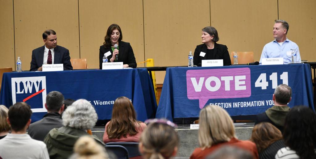 From left to right, school board candidates Ananta Gudipaty, Cristina Martinez, Jody Lee and Todd White engaged in the Oct. 18 forum. Maggie Tai Tucker couldnt attend the meeting due to a family emergency and sent in a candidacy statement that the moderator read to the crowd. Andy Nystrom/ staff photo