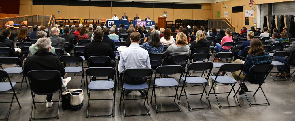 Attendees gathered to listen to city council candidates, from left to right, Michael Curry, Craig Reynolds, Andrew Friedman and Jake Jacobson, as they answered questions during the Mercer Island Candidate Forum on Oct. 18 at Islander Middle School. Andy Nystrom/ staff photo