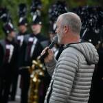Parker Bixby, who is one of three band directors along with Jacob Krieger and Kyle Thompson, communicates with the Mercer Island High School marching band during a full dress rehearsal on Oct. 12. Andy Nystrom/ staff photo