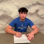 Mercer Island High School senior football player Cole Krawiec signed a national letter of intent to play next season for the Pomona Pitzer colleges squad in Claremont, California. Krawiec was a first-team 3A All-KingCo running back this season. Photo courtesy of the Mercer Island School District