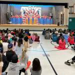 The Mercer Island High School drill team performs at West Mercer Elementary School on Dec. 6. Photo courtesy of the Mercer Island School District