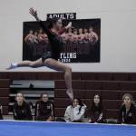 Bella Nguyen leaps into action on the floor this season. Photo courtesy of Miller Fosseen