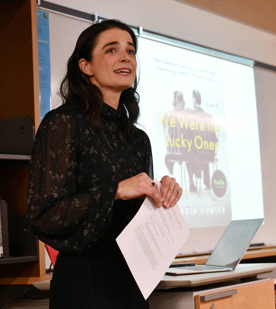 Georgia Hunter speaks about her Jewish familys harrowing Holocaust survival story on Jan. 9 at the Islander Middle School Library. Andy Nystrom/ staff photo